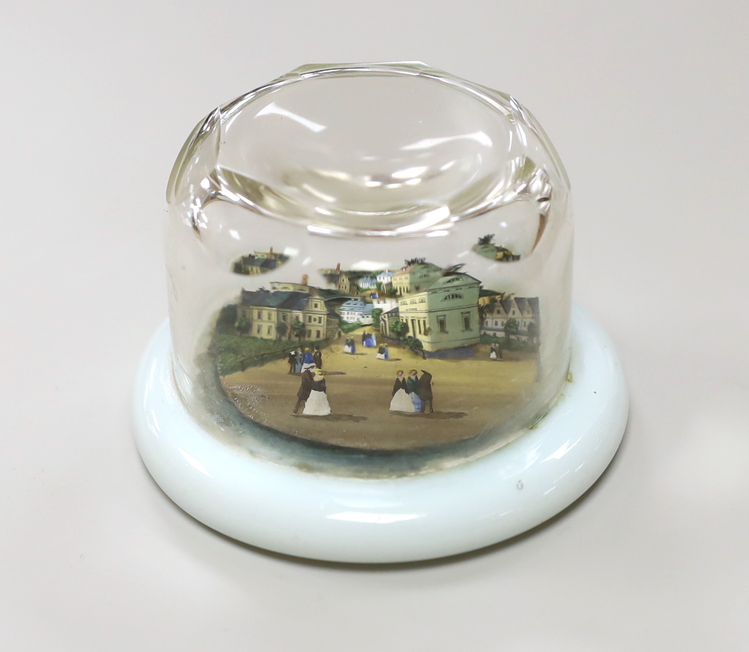 An unusual 19th century Continental diorama cut card glass cased paperweight, 6cm high
